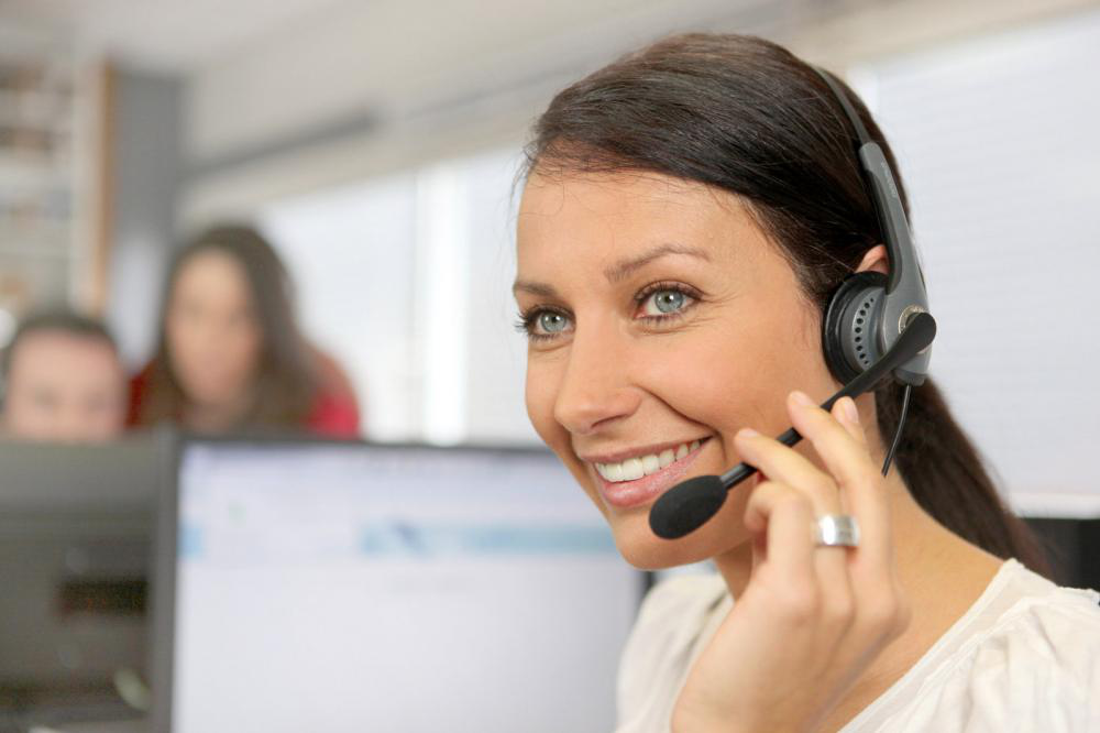 smiling employee with headset